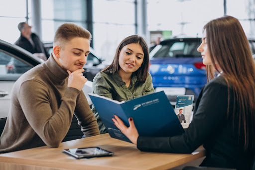 People reviewing economy vs compact rental car pricing options